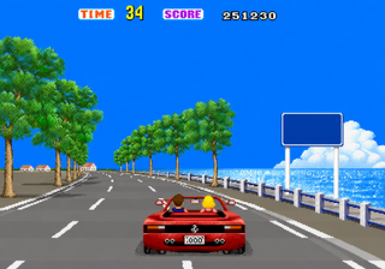 15. A coastal road opens beside a blue sign and glittering water
