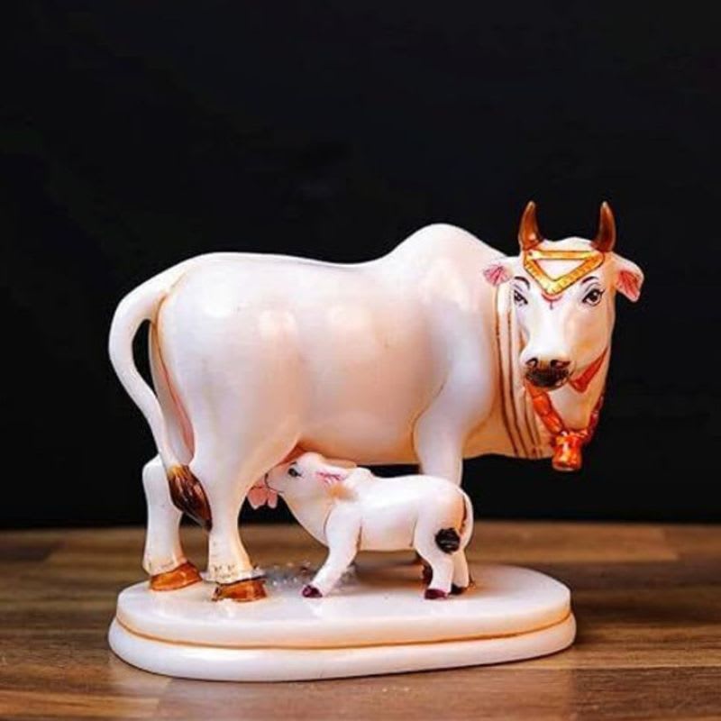 Rjkart Kamdhenu Cow with Calf decorative idol clean white finish with gold work Decorative Showpiece - 9 cm