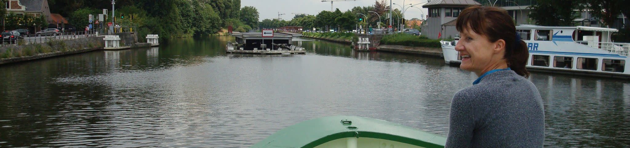 Patsie on barge Johanna Entering Bruges