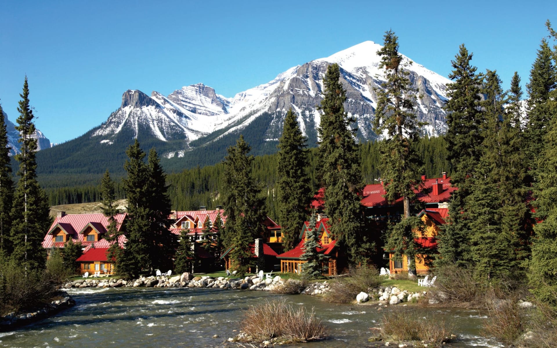 Post Hotel & Spa in Lake Louise:  Post Hotel & Spa_ExteriorWithPipestoneRiver