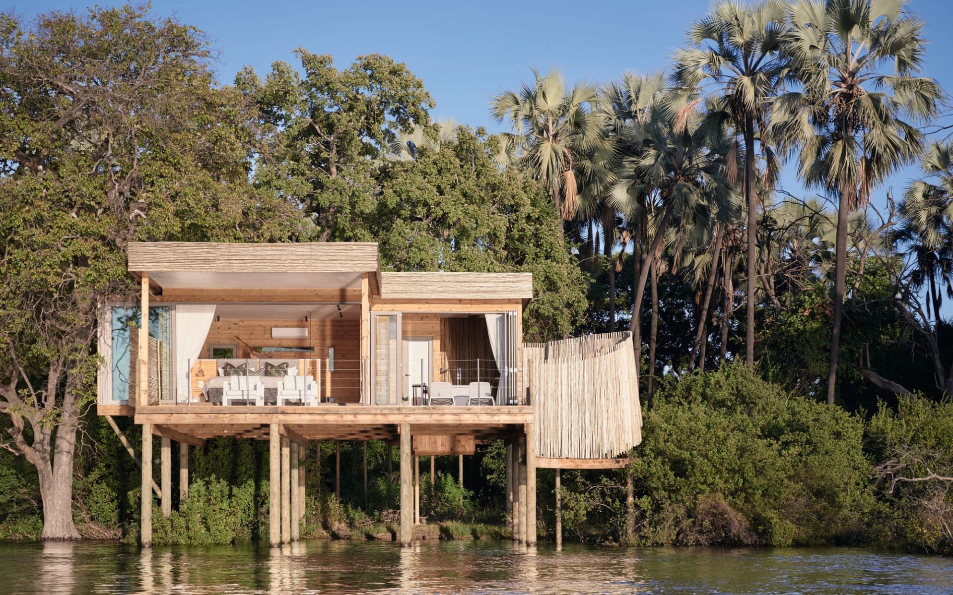 Victoria Falls Island Lodge: exterior Victoria Falls River Lodge - Island Treehouse mit Blick vom Zambezi