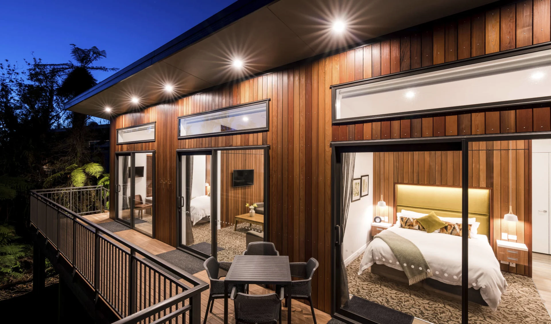 Rainforest Retreat in Franz Josef:  TH_Ext_Deck-bedroom_Evening_1_L