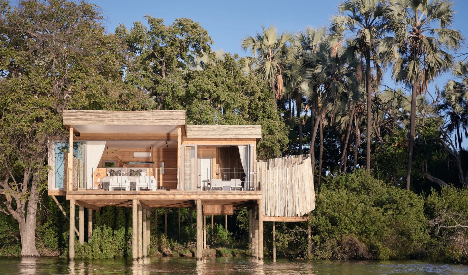 Victoria Falls Island Lodge: exterior Victoria Falls River Lodge - Island Treehouse mit Blick vom Zambezi