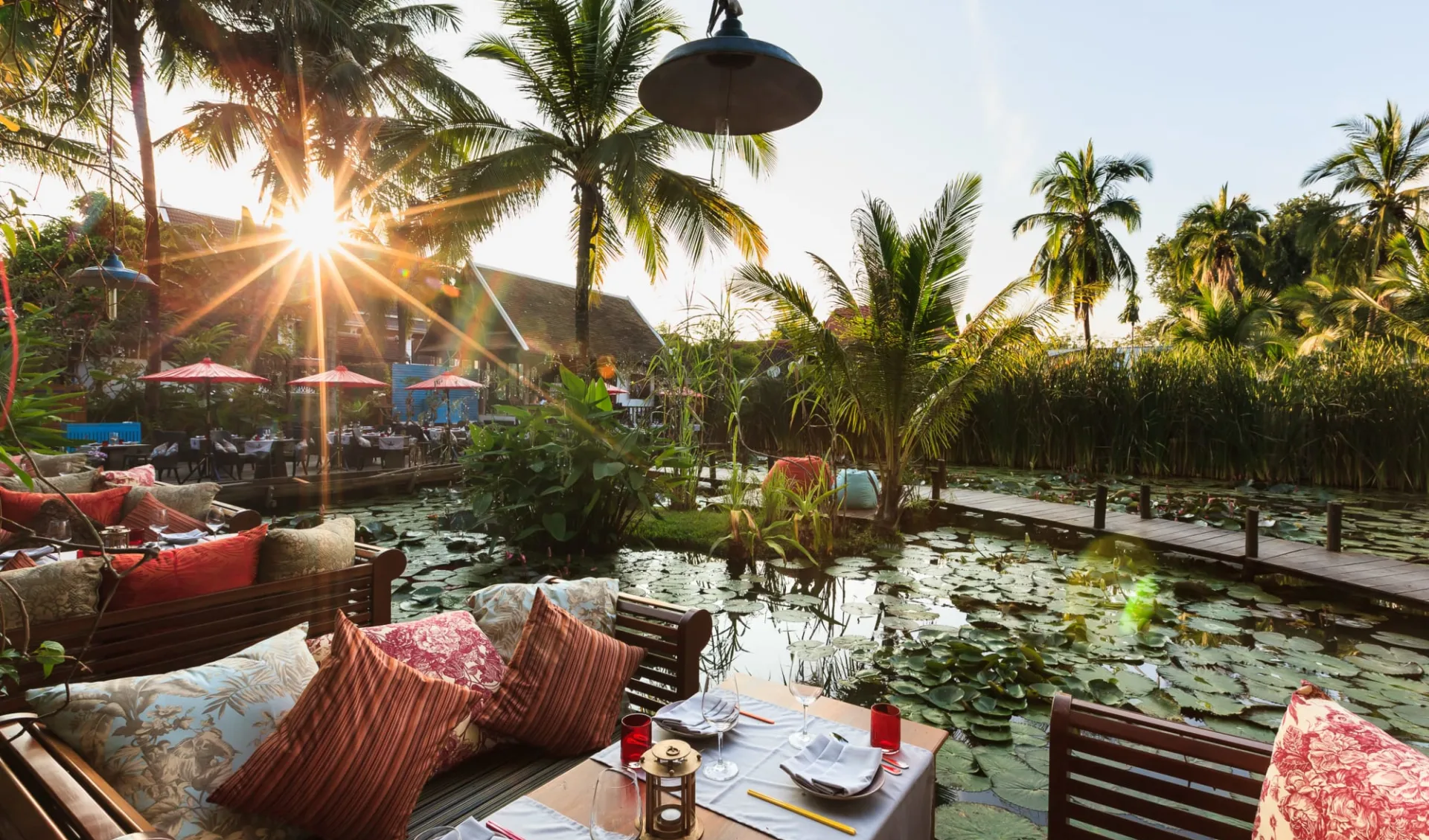 Maison Dalabua in Luang Prabang:  Dining by the pond