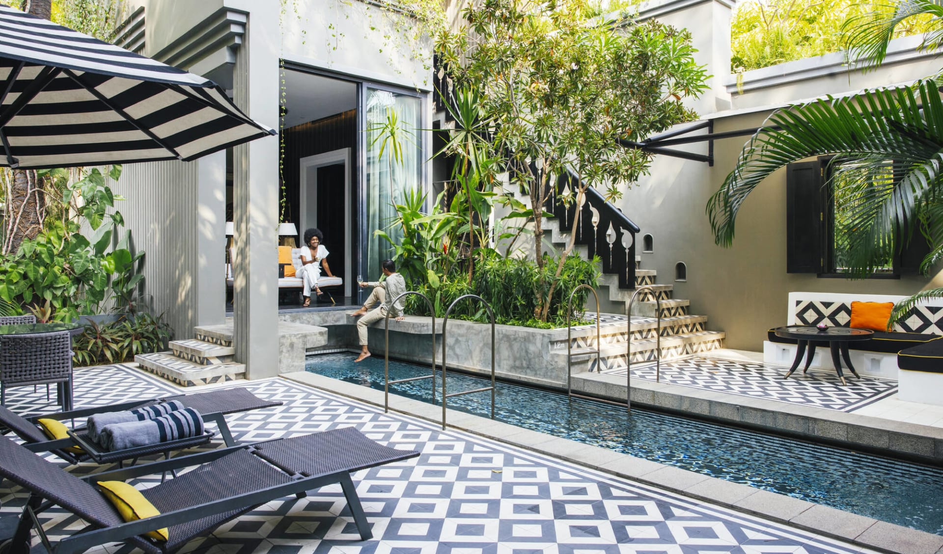 Shinta Mani Bensley Collection Pool Villas in Siem Reap:  Pool Villa | swimmingpool with sun chairs
