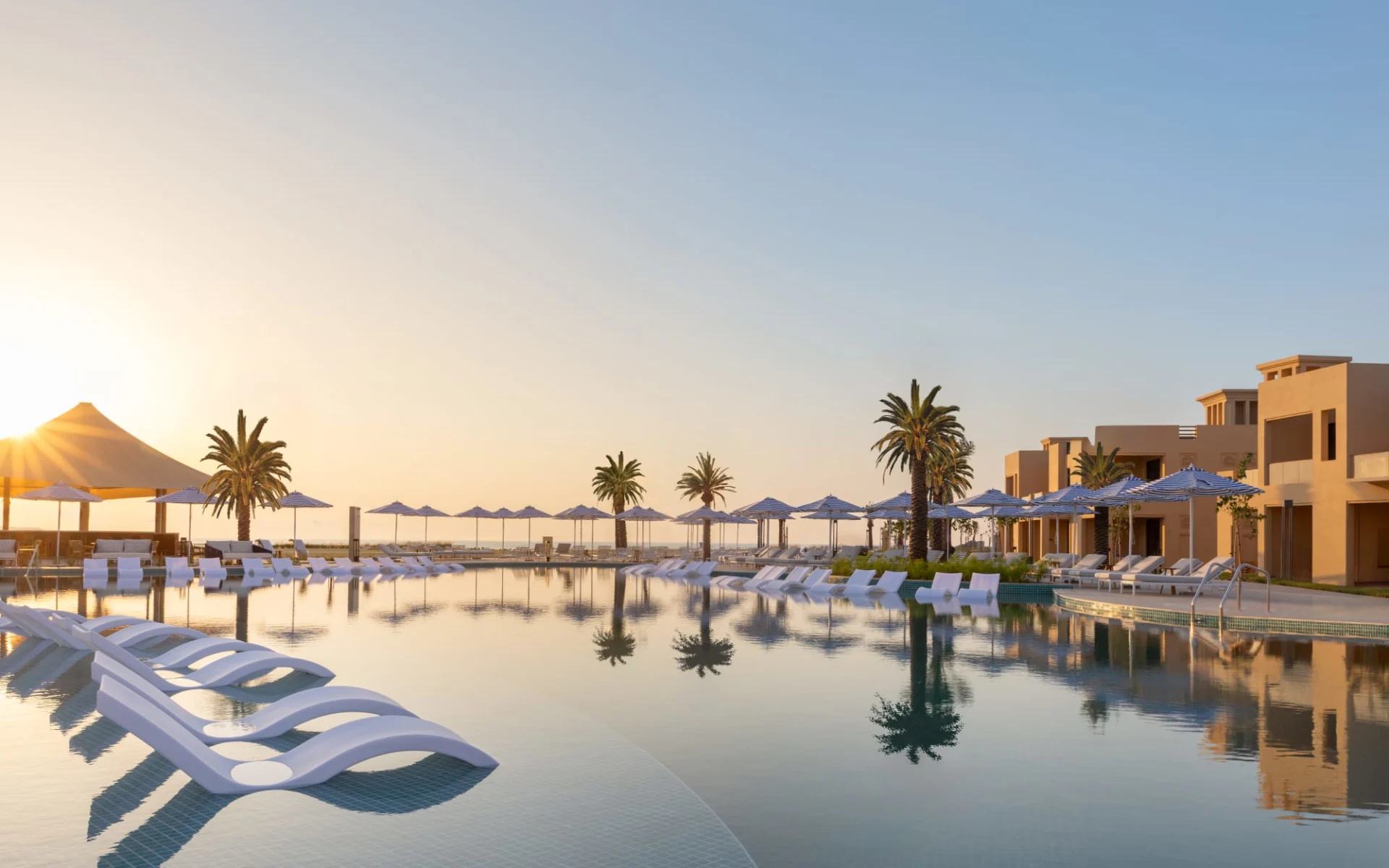 Sofitel Al Hamra Beach Resort in Ras al Khaimah:  Lagoon_Pool_Sunset