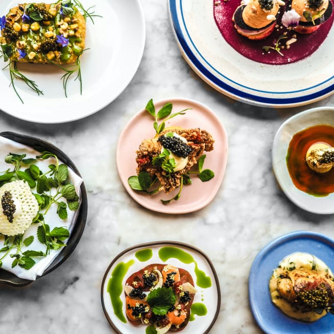 Variety of cooked dishes arranged on Ceramic Plates