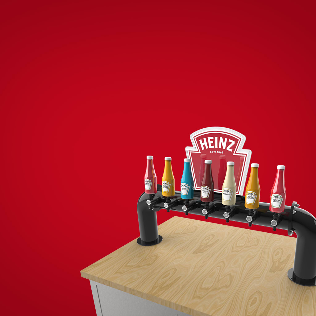 A  bar tapline with different Heinz sauces as tap handles.