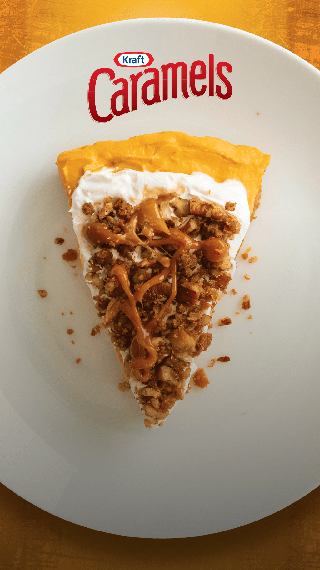 A slice of tart with nuts, whipped cream sits on a white plate with the Kraft Caramels logo