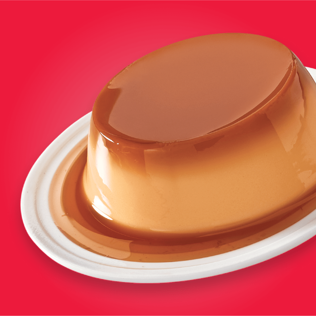 Jell-O pudding on a plate on a red background