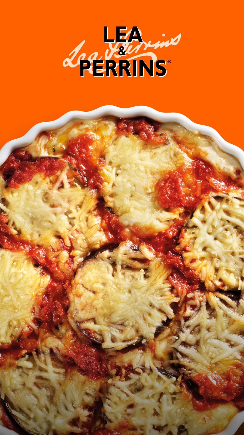 A cheesy casserole on an orange background.