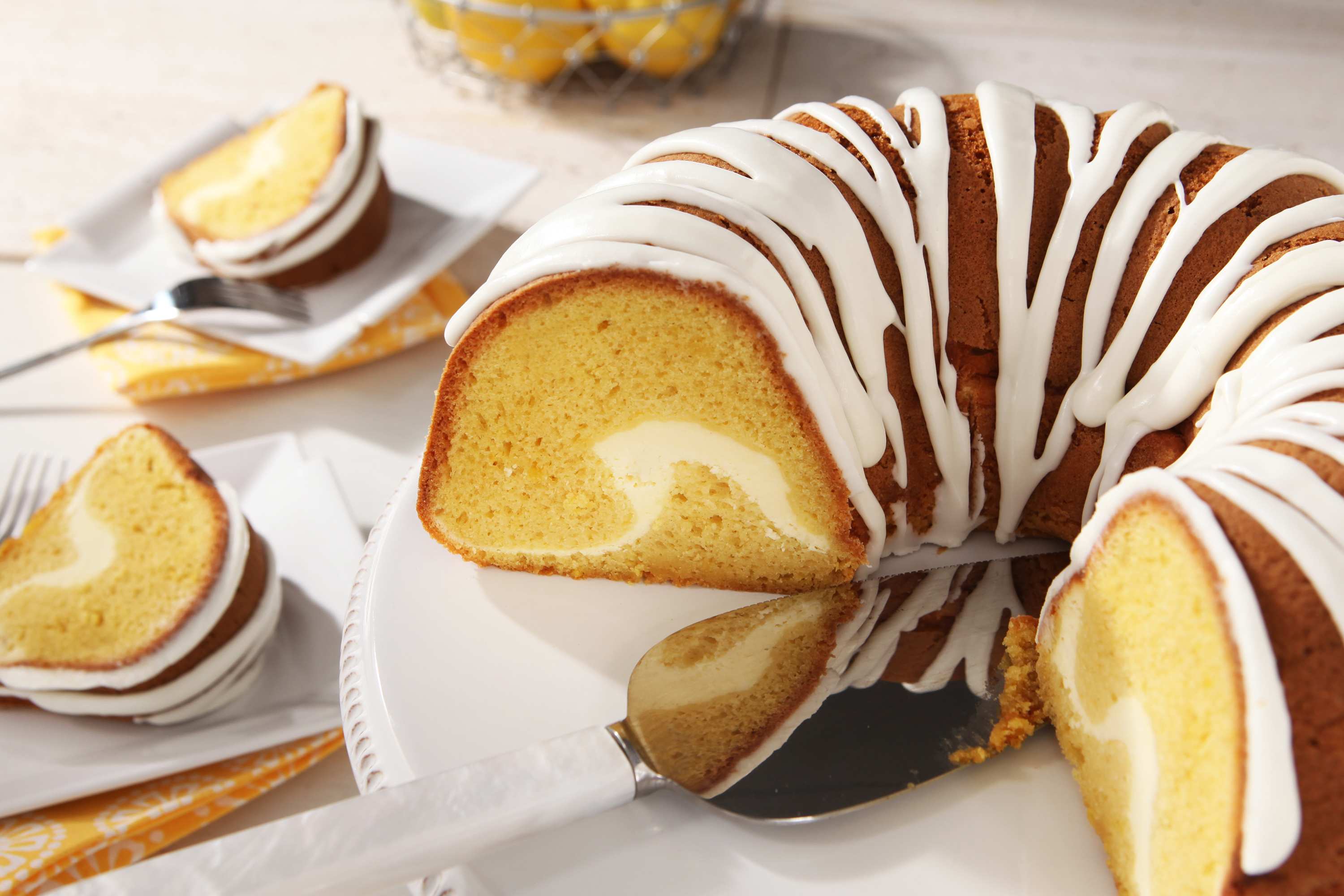 https://res.cloudinary.com/kraft-heinz-whats-cooking-ca/image/upload/f_auto/q_auto/c_limit%2Cw_3840/v1/dxp-images/brands/Recipes/all-recipe-assets/lemon-cake-with-cheesecake-tunnel/7c457421fd124f12a61464ef6bed0a6f_l3ywya?_a=BAVMn6ID0