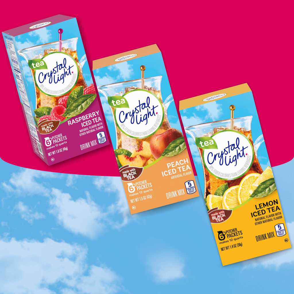 Three boxes of Crystal Light Iced Tea drink mix in Raspberry, Peach, and Lemon flavors