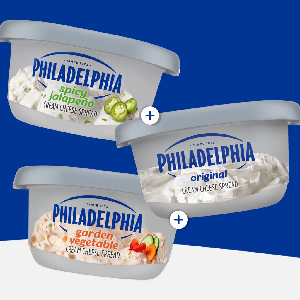 Three Philadelphia Cream Cheese Spreads against a vibrant blue background: Spicy Jalapeno, Garden Vegetable, and Original.