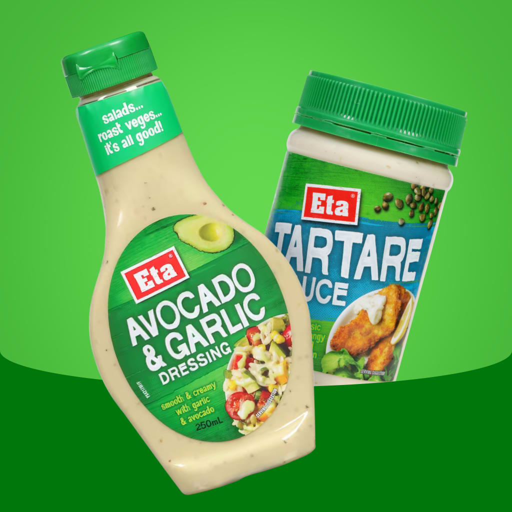 Eta Tartare Sauce and Eta Salad Dressing over a green background.