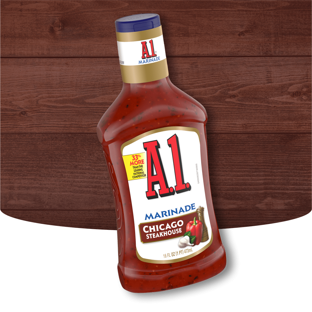 A.1. Chicago Steakhouse marinade bottle on a red background and wood surface.