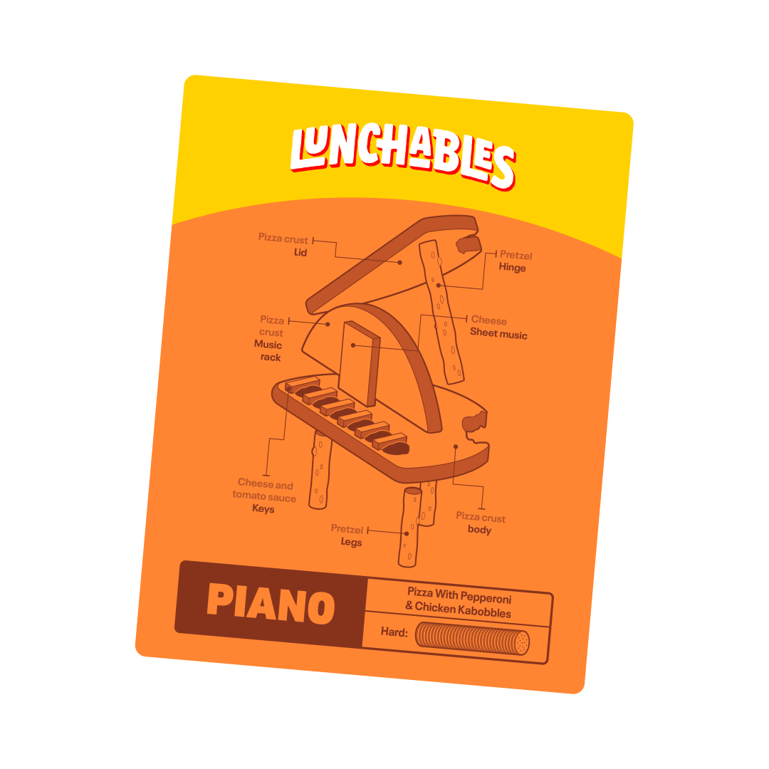 A Lunchables box shows a piano made of pizza crust, cheese and pretzels.