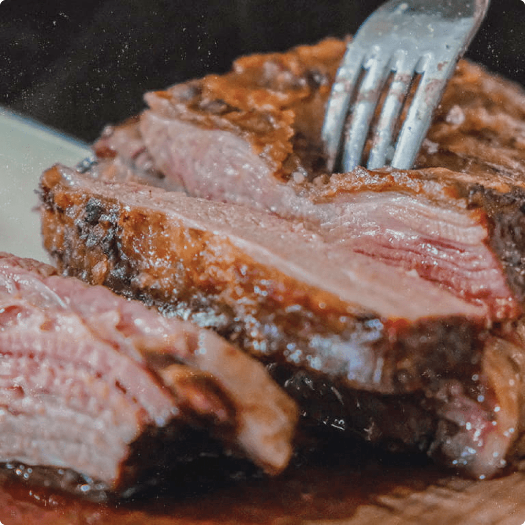 A steak being carved.