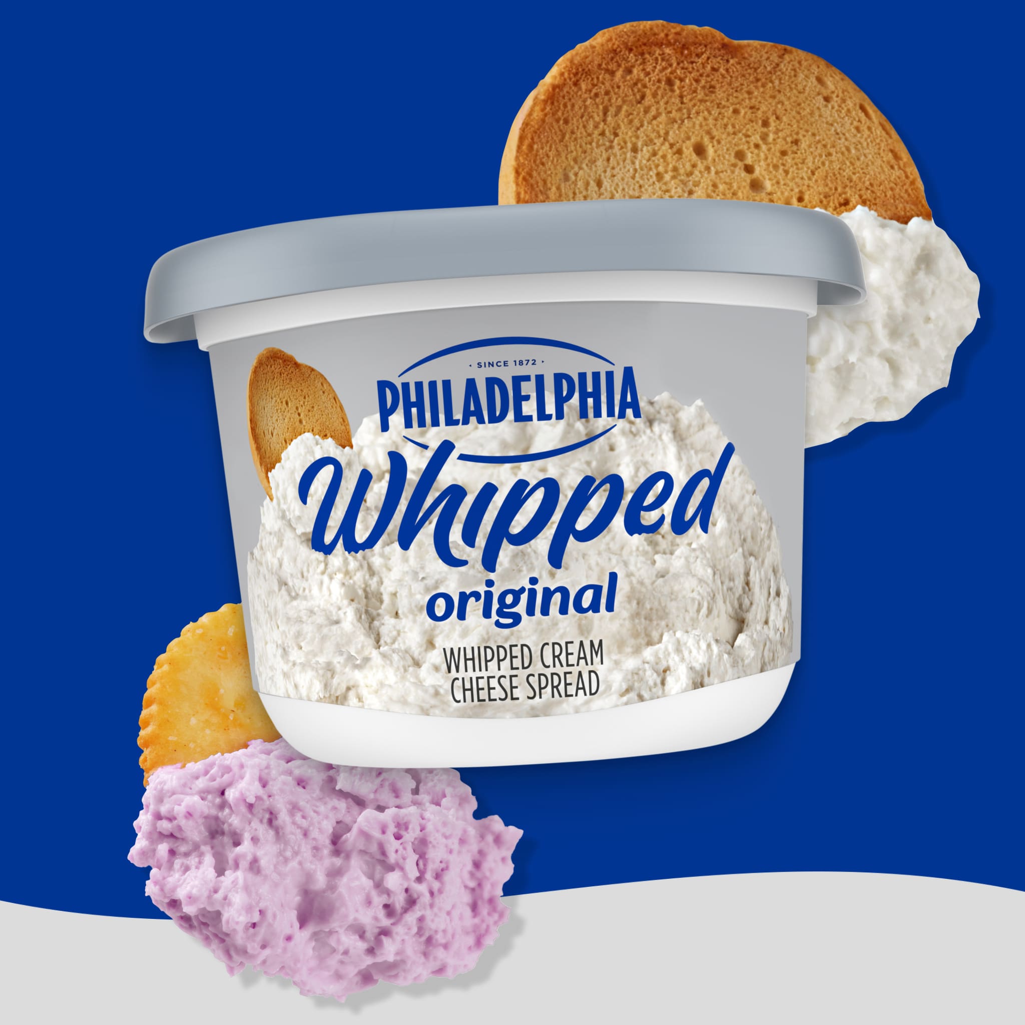 Philadelphia Whipped Original Cream Cheese Spread with Bread and Cracker.