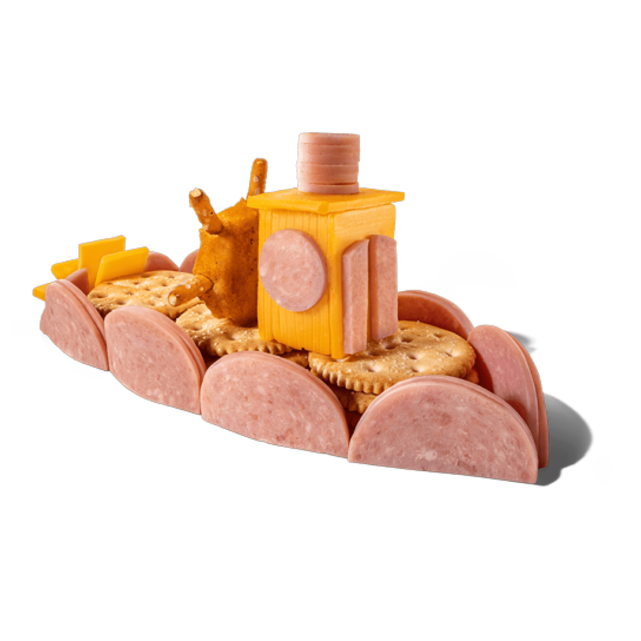 A boat made of crackers, cheese, pretzels, and sliced meat.