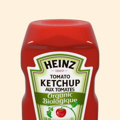 Top-down view of a Heinz Organic Tomato Ketchup bottle, showcasing the label.