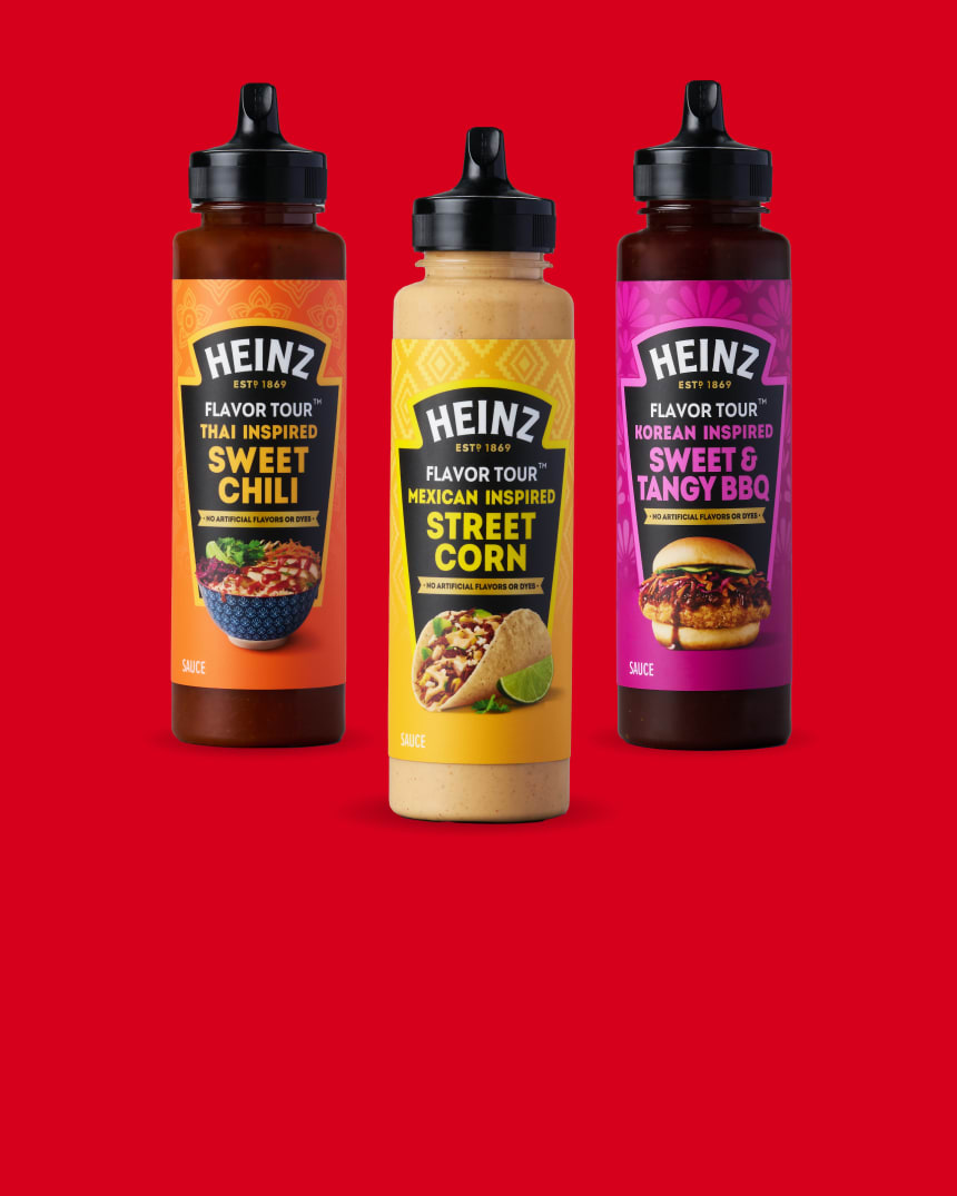 Three Heinz Flavor Tour sauce bottles are displayed against a bold red background. From left to right, the sauces are: Thai I
