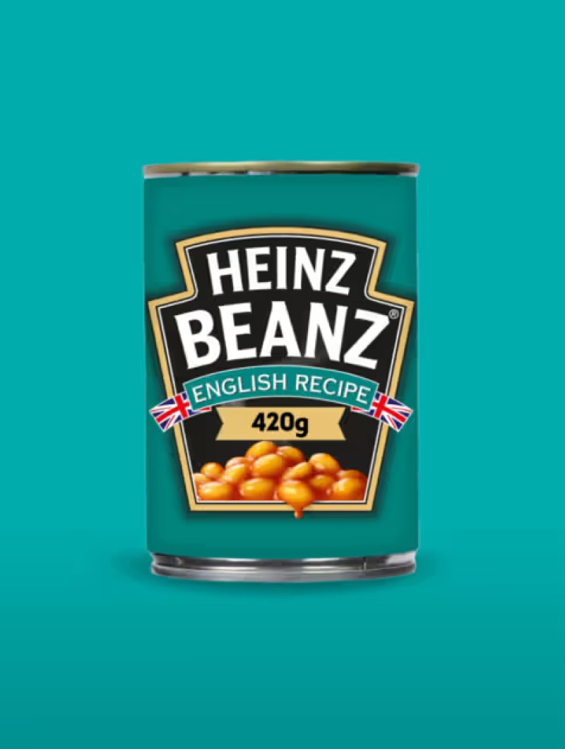 A turquoise can of Heinz Beanz English Recipe, featuring a picture of baked beans, against a blue-green background.