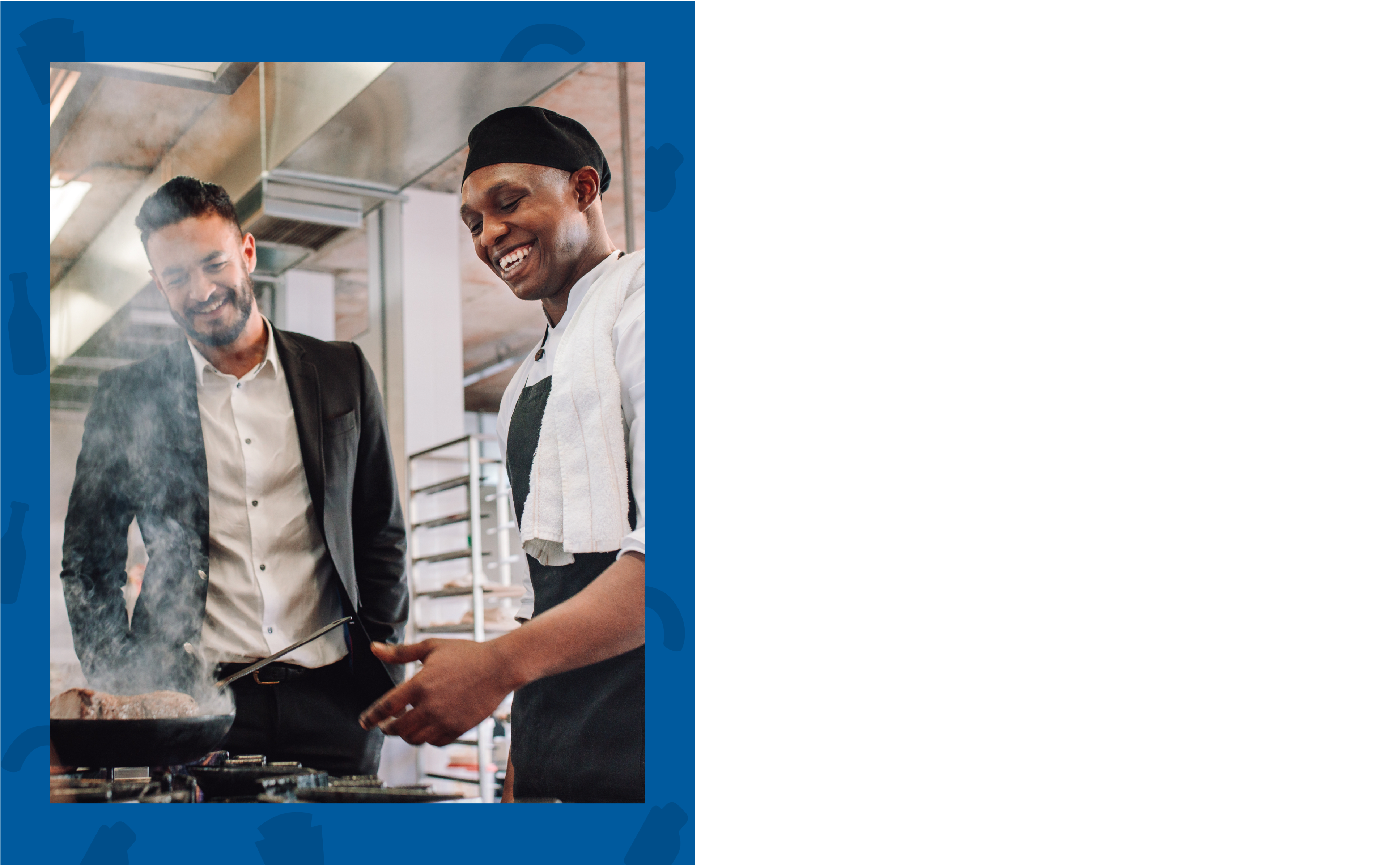 A chef and manager in a kitchen, reviewing food being cooked in a pan
