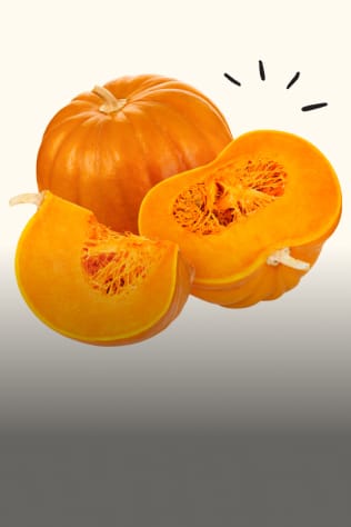 Image of a whole pumpkin, a halved pumpkin, and a slice, showcasing the vibrant orange flesh and seeds.