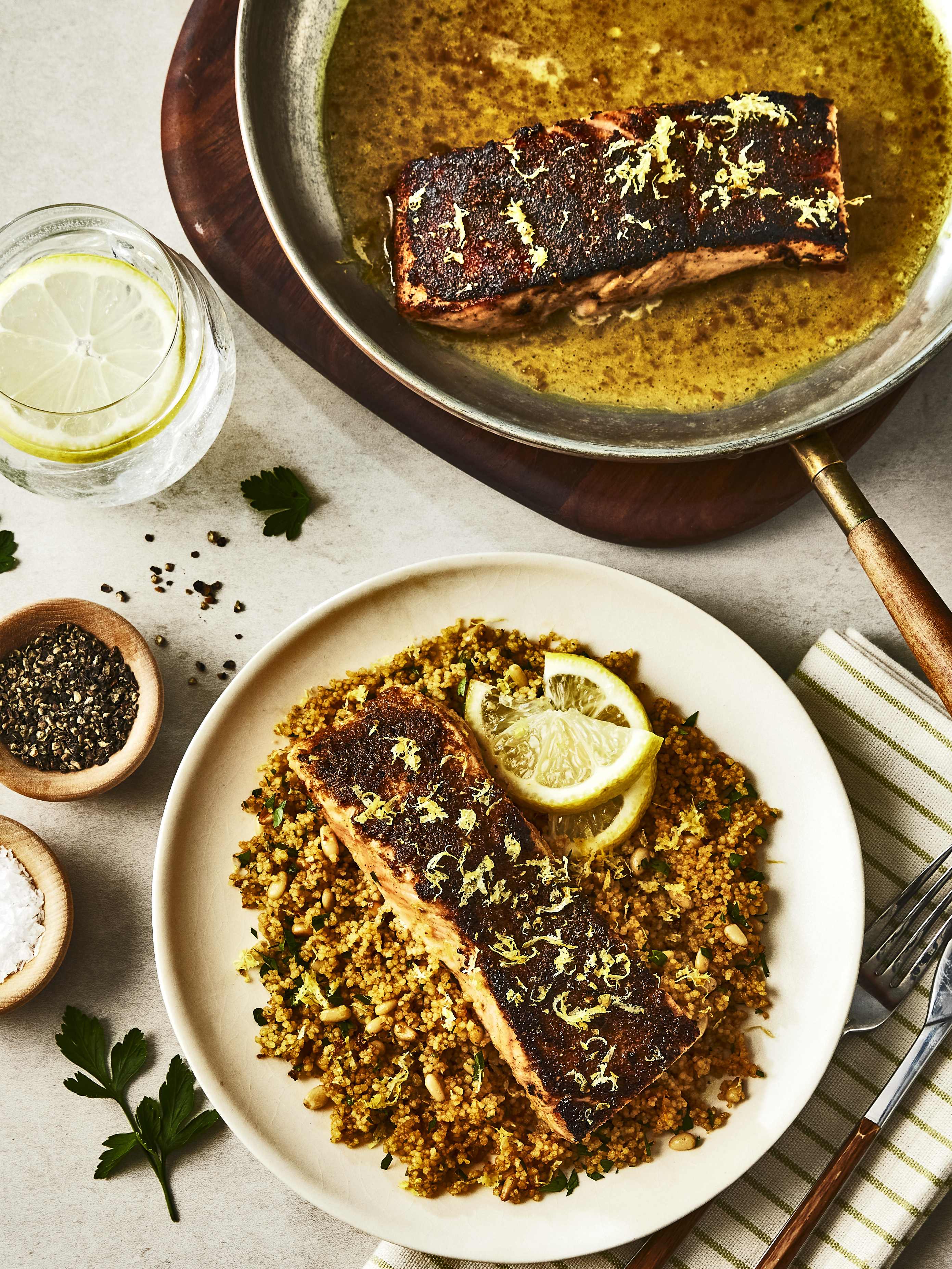 A serving of Moroccan Lemon-Seared Salmon with Sundried Tomato Couscous, which features products from Pure by J.L. Kraft Dressings.
