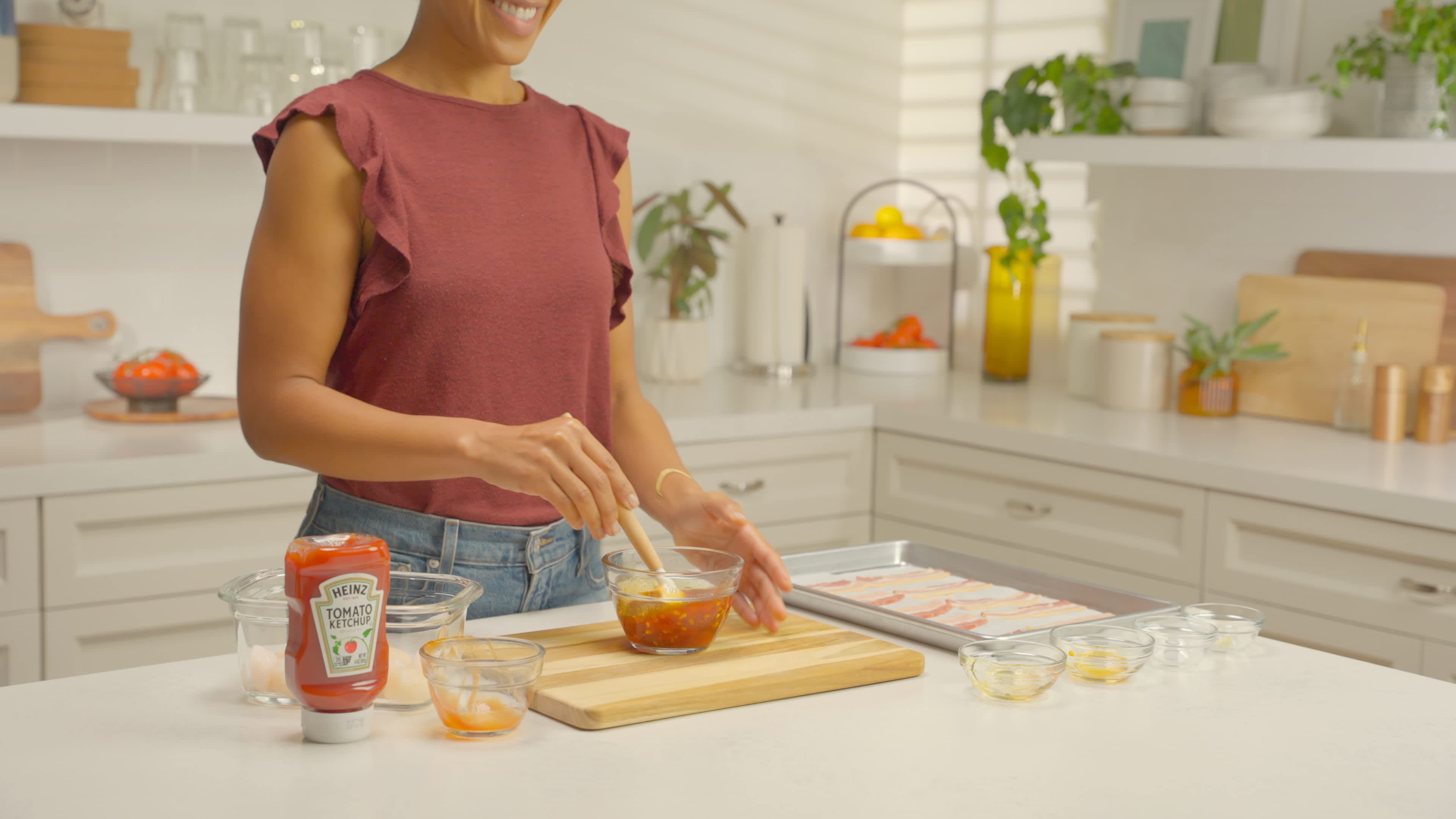 Remaining ingredients are mixed into a glass bowl and blended to create the honey garlic ketchup mixture.