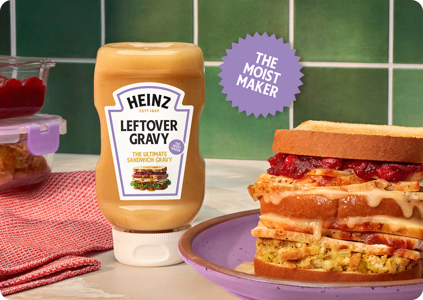 Heinz Leftover Gravy, AKA 'The Moist Maker,' next to a Thanksgiving leftover sandwich.