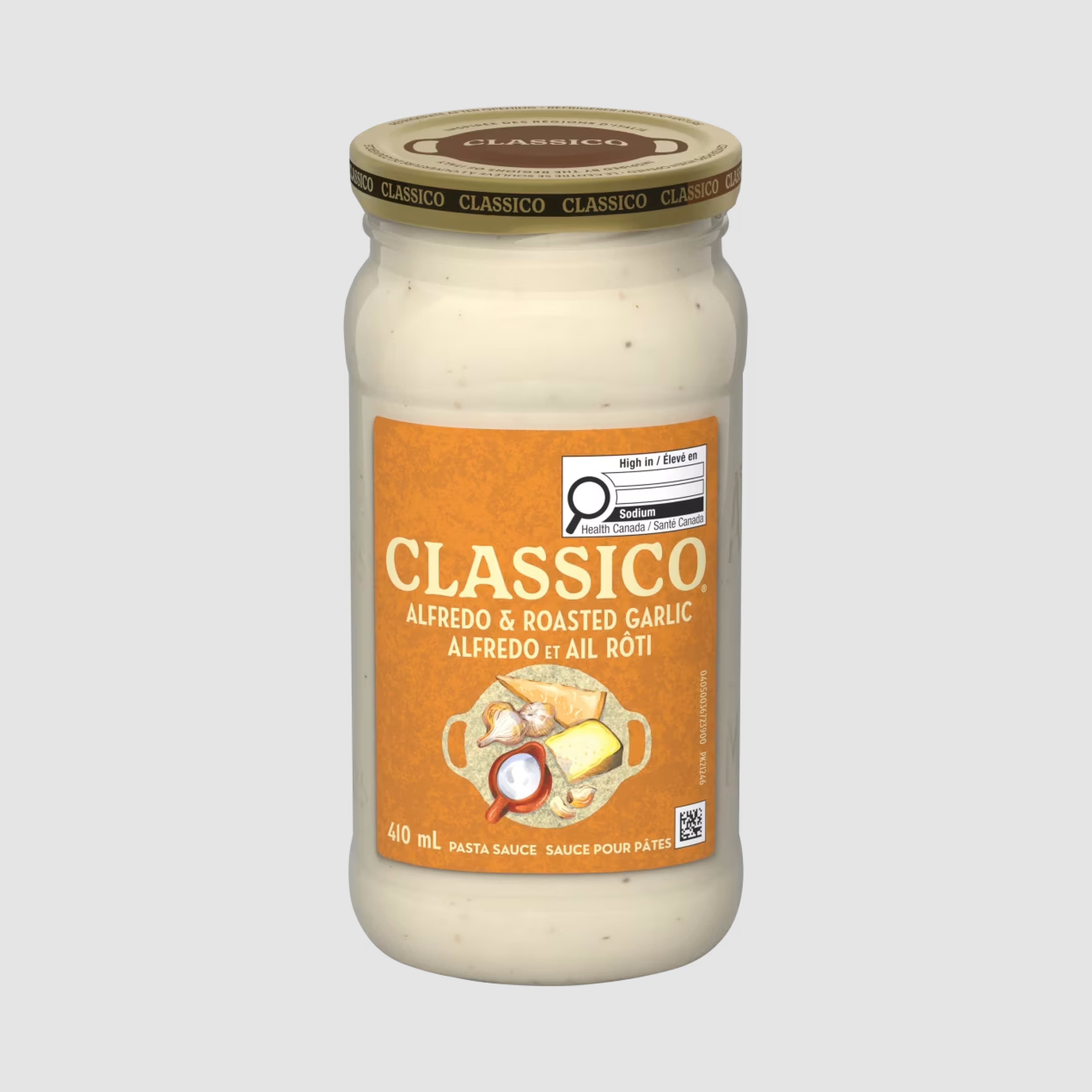 A jar of Classico Alfredo & Roasted Garlic Spaghetti pasta sauce.