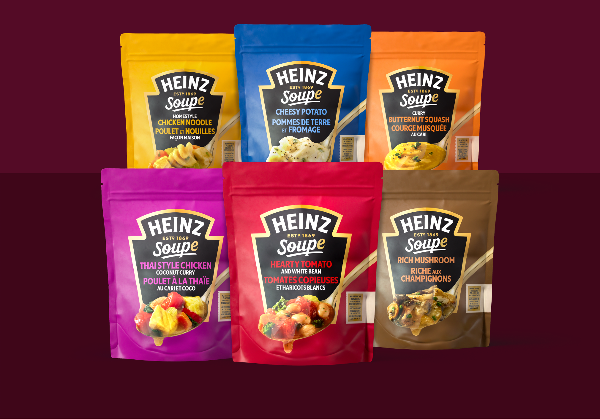 Six colorful pouches of Heinz Soupe in various flavors lined up against a dark red gradient background.
