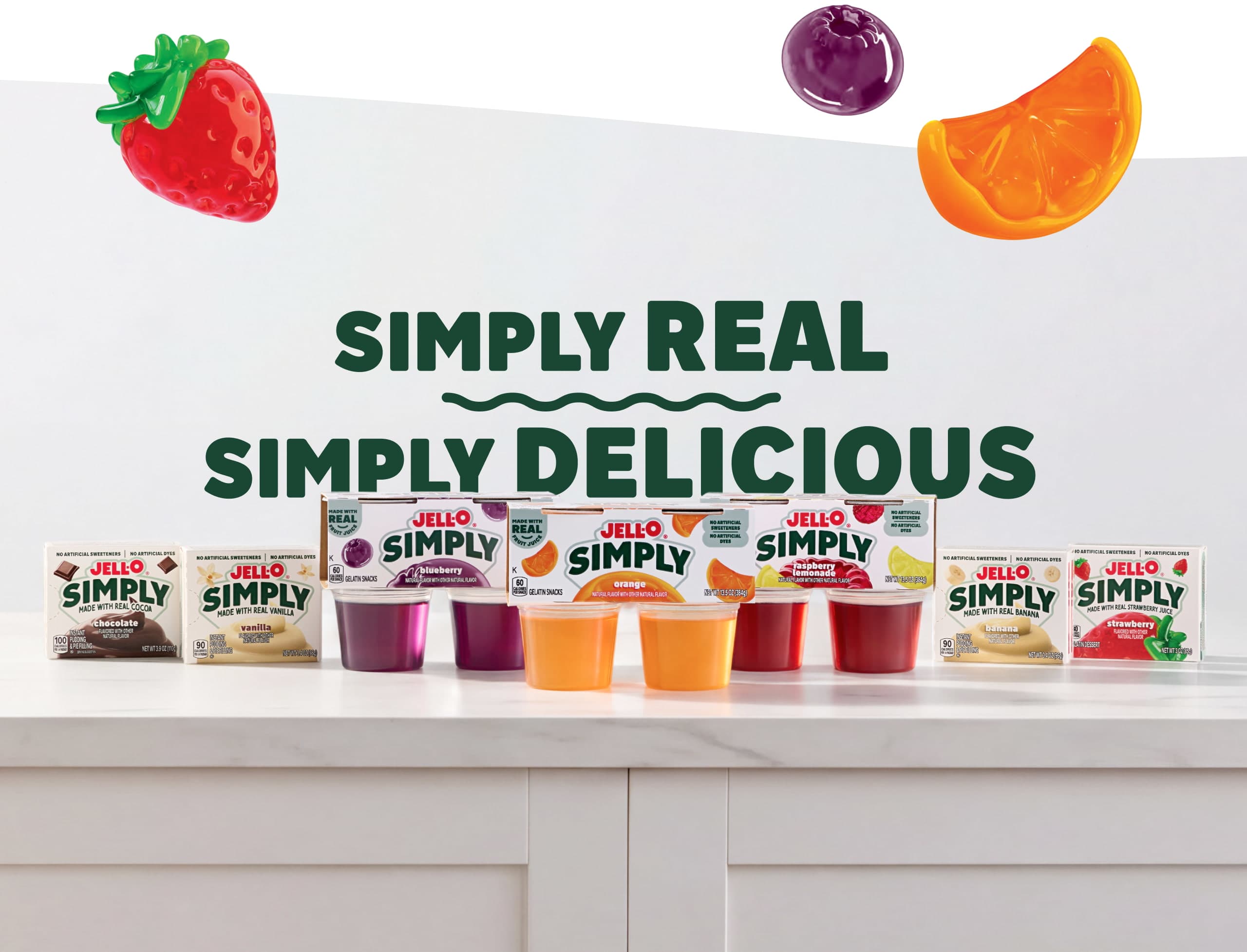 Jell-O Simply product family under the text "Simply Real Simply Delicious" with floating fruit graphics.