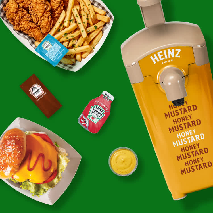 Heinz sauces and dispensing solutions alongside popular menu items like a cheeseburger, chicken tenders, and fries.