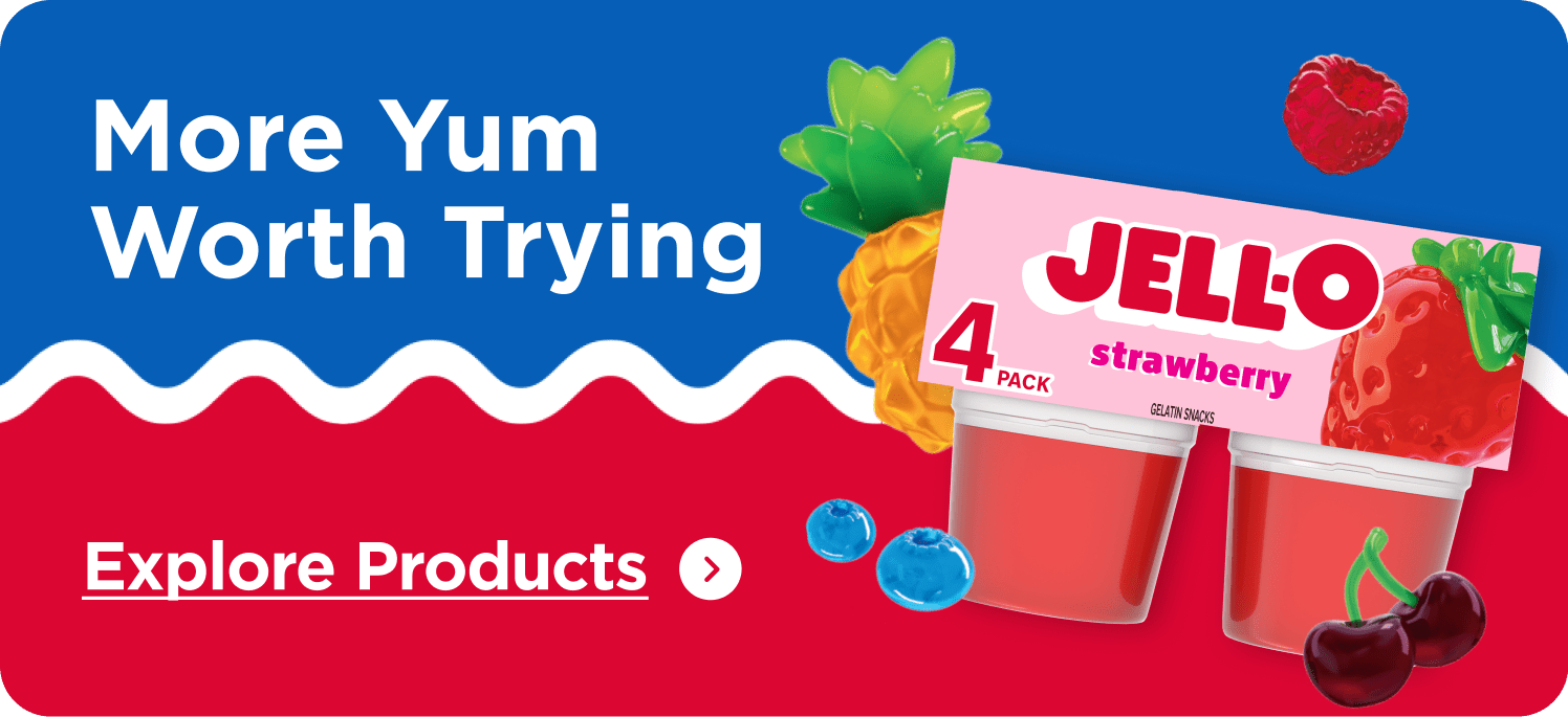 Jell-O Strawberry gelatin 4-pack with pineapple, raspberries, blueberries, and cherries on a vibrant blue and red background.