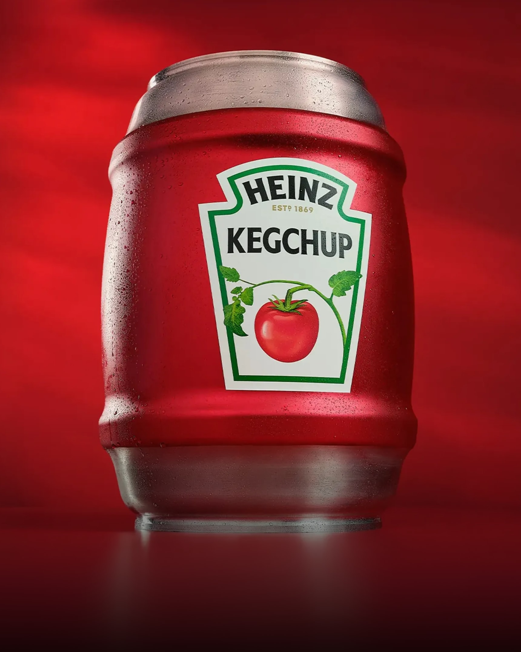 A red Heinz "Kegchup" keg, with a silver top and bottom. The Heinz logo is displayed, featuring HEINZ ESTD 1869 and KEGCHUP.
