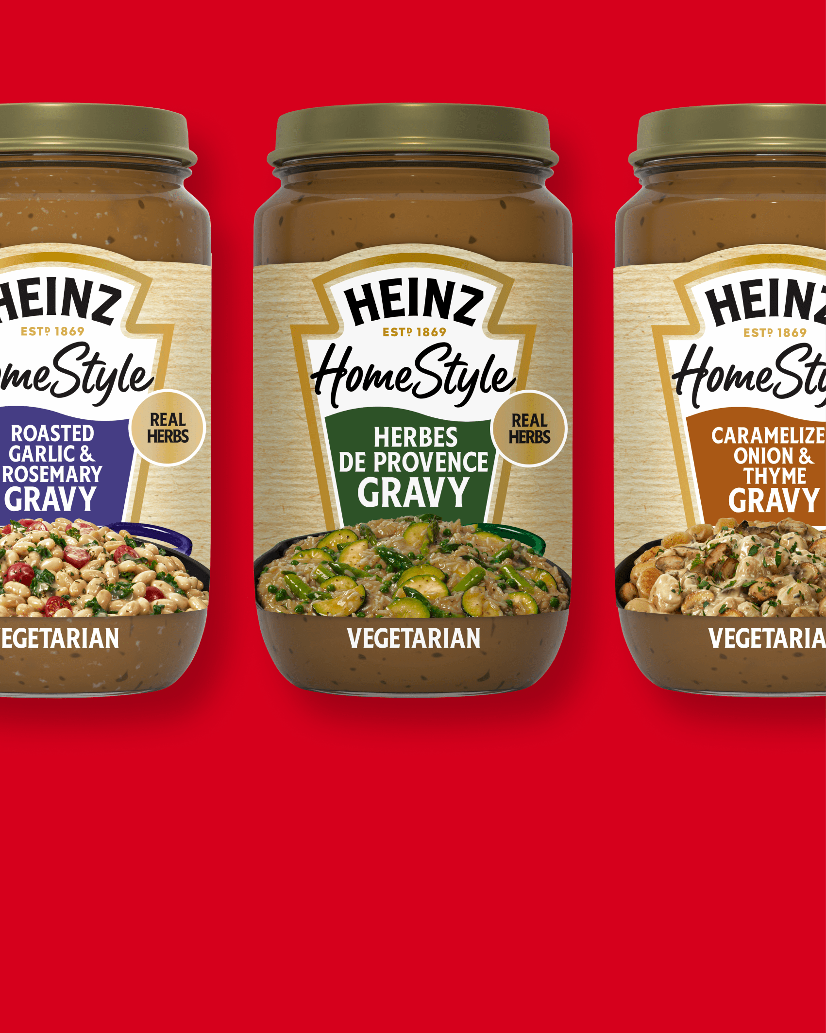 Three jars of Heinz HomeStyle Vegetarian Gravy in Roasted Garlic & Rosemary, Herbes de Provence, and Caramelized Onion & Thym