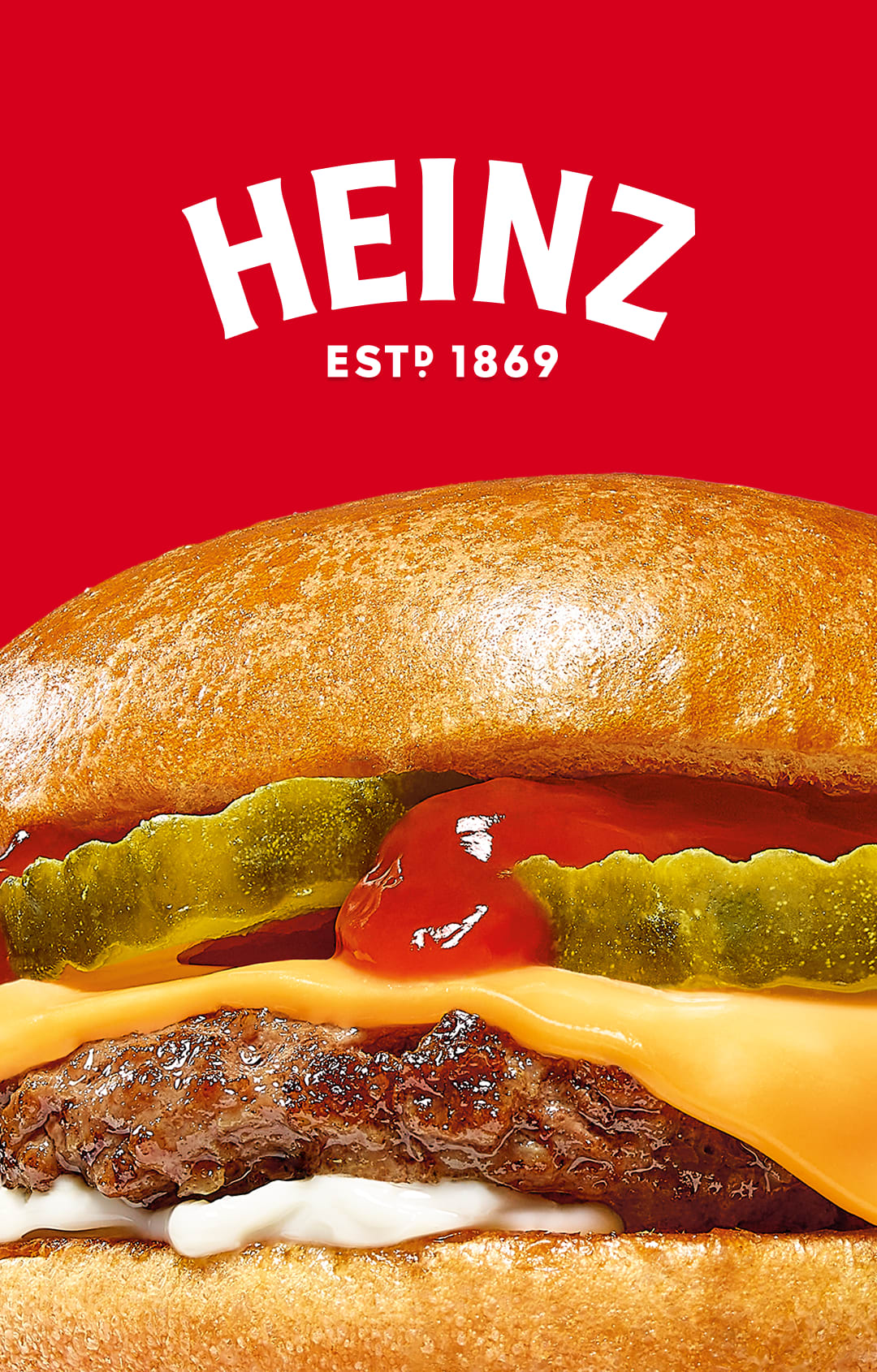The Heinz logo over a red background, with the top of a hamburger