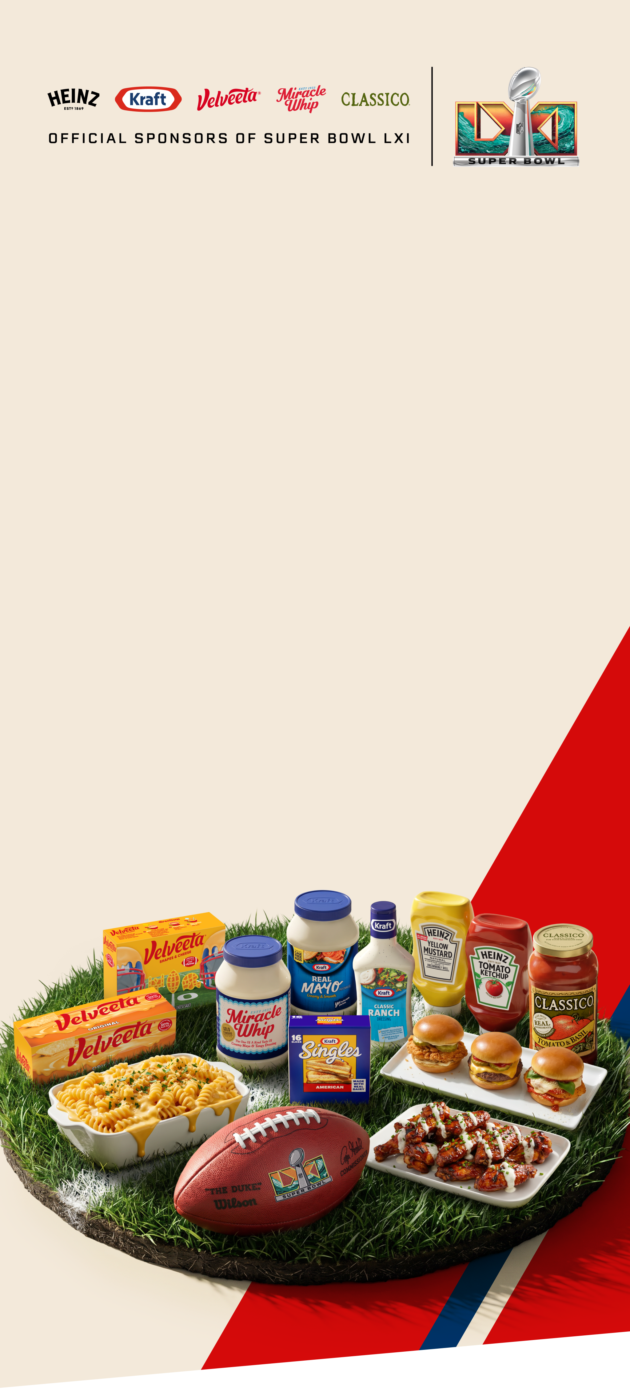 A football party food spread with wings, sliders, mac and cheese, and Kraft Heinz condiments on grass.