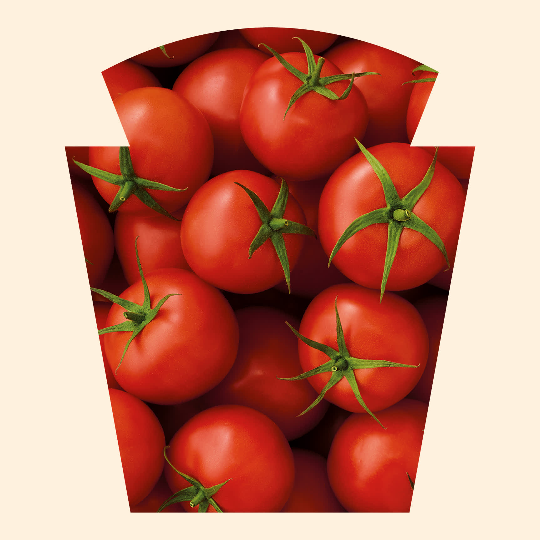 Tomates rouges à l'intérieur d'une forme de bouteille de ketchup.