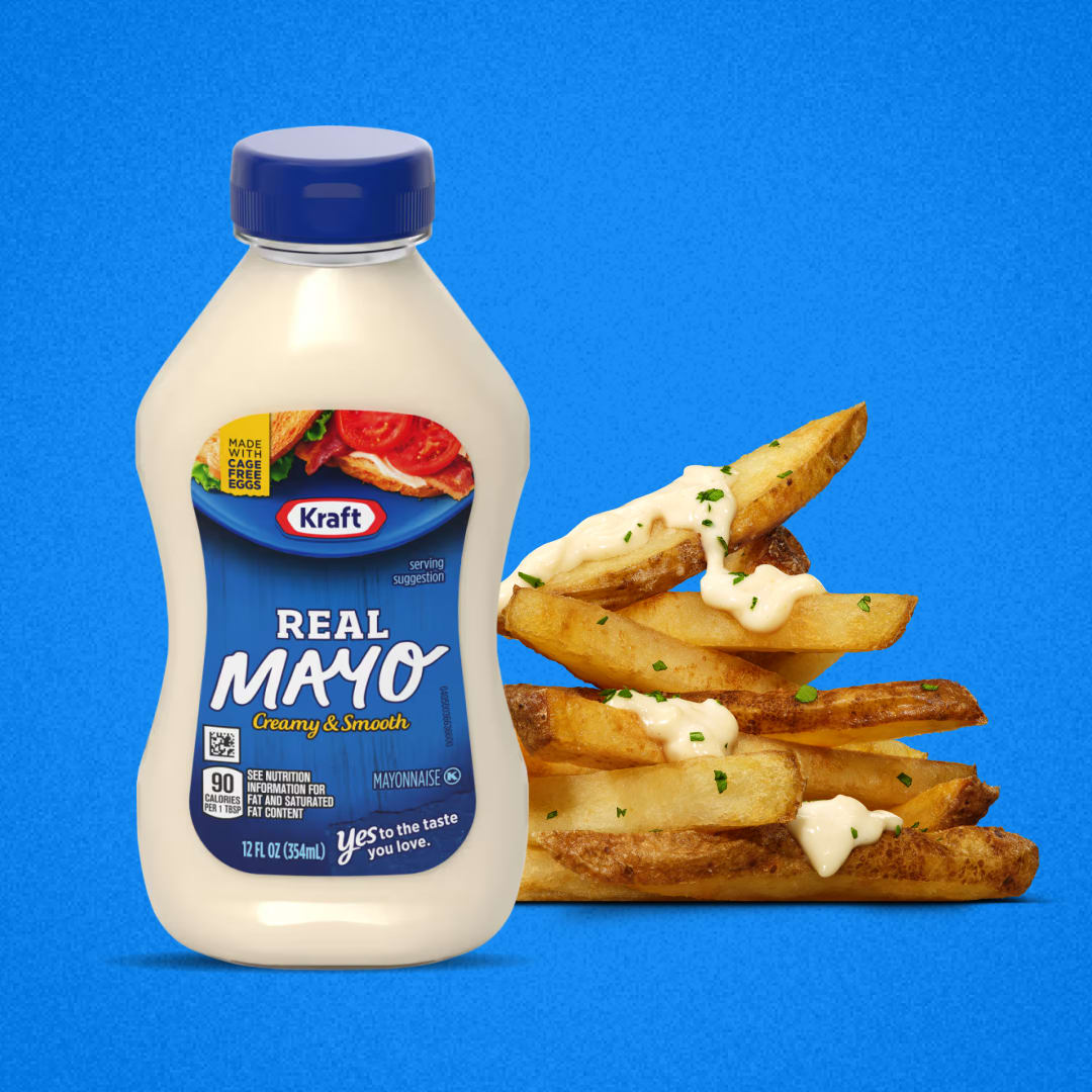 Kraft Real Mayo bottle next to french fries with mayonnaise.