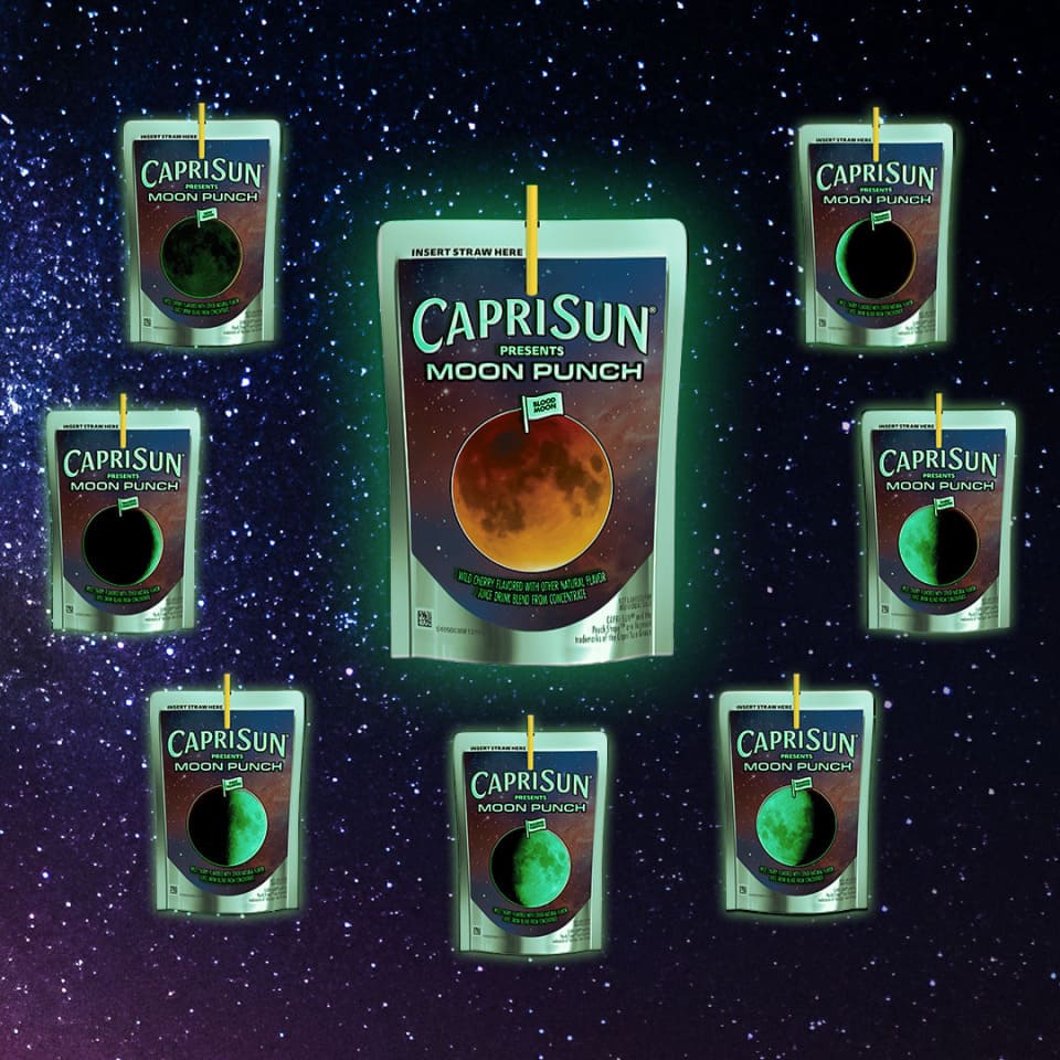 Capri Sun Moon Punch pouches in a starlit space.
