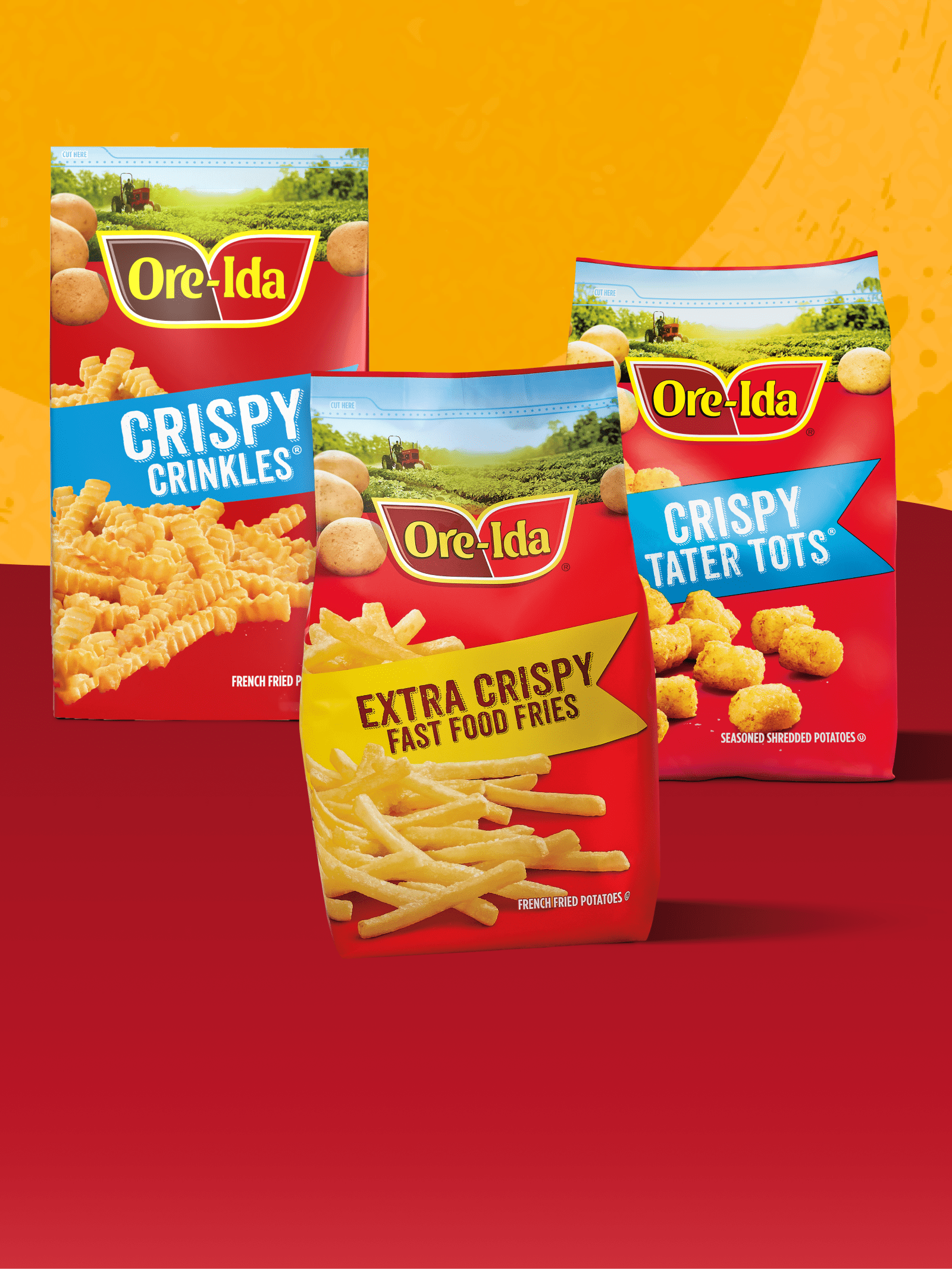 Three bags of Ore-Ida frozen potatoes: Crispy Crinkles, Extra Crispy Fries, Crispy Tater Tots.