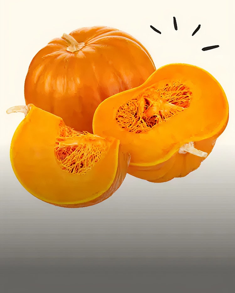 Image of a whole pumpkin, a halved pumpkin, and a slice, showcasing the vibrant orange flesh and seeds.