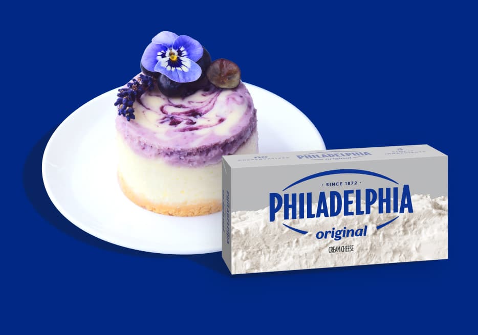 A mini Blueberry cheesecake with a classic brick of Philadelphia Cream Cheese
