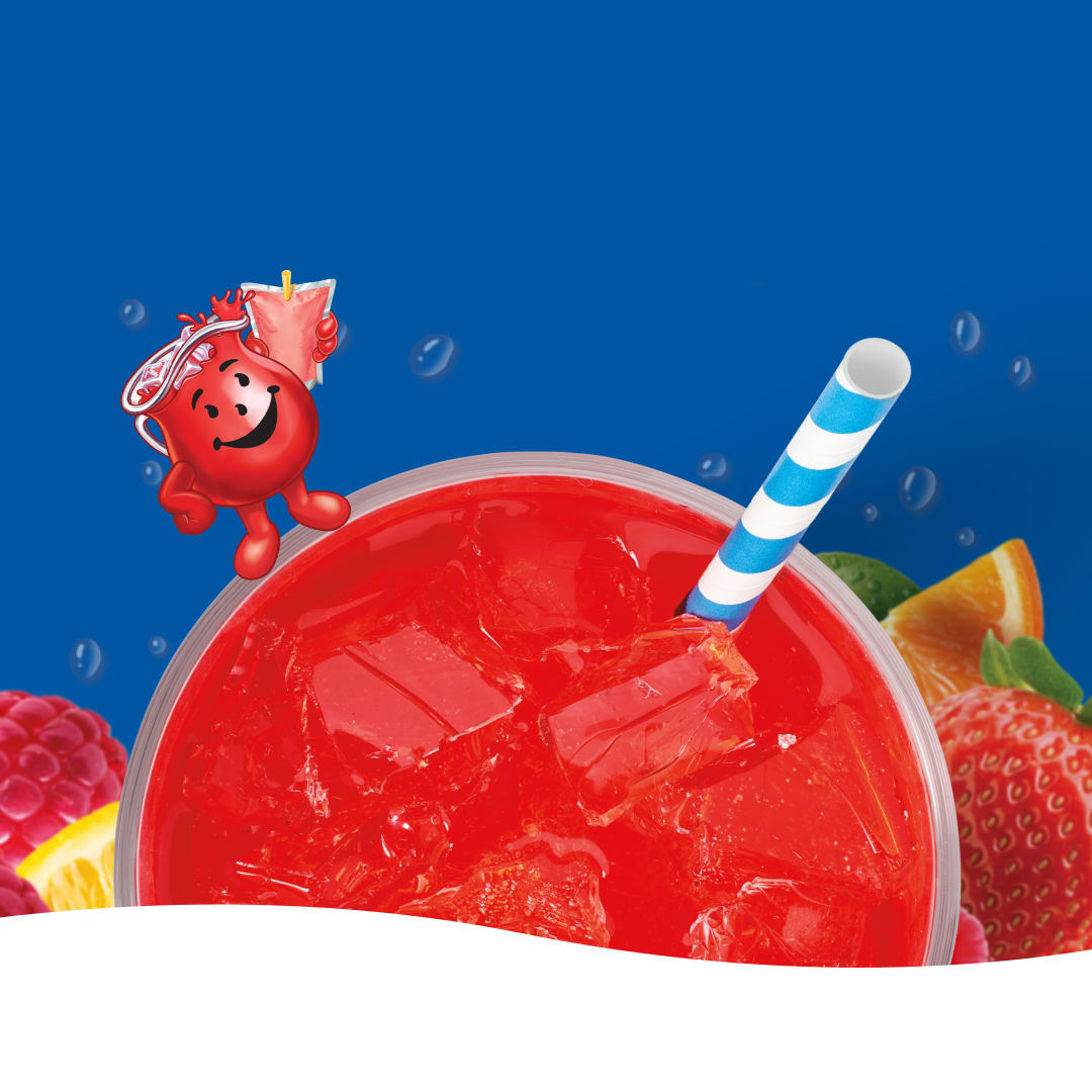 Kool-Aid Man character next to a clear cup of red Kool-Aid with ice, a striped straw, raspberries, and strawberries.
