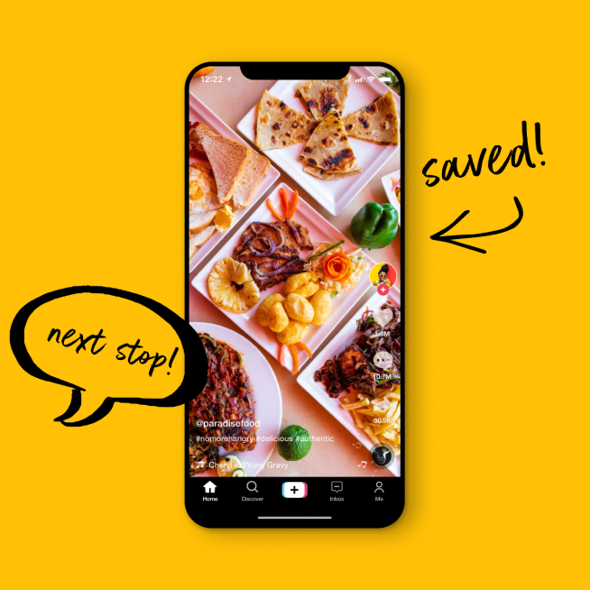 Cellphone showing Instagram with a photo of many plates of food on a table