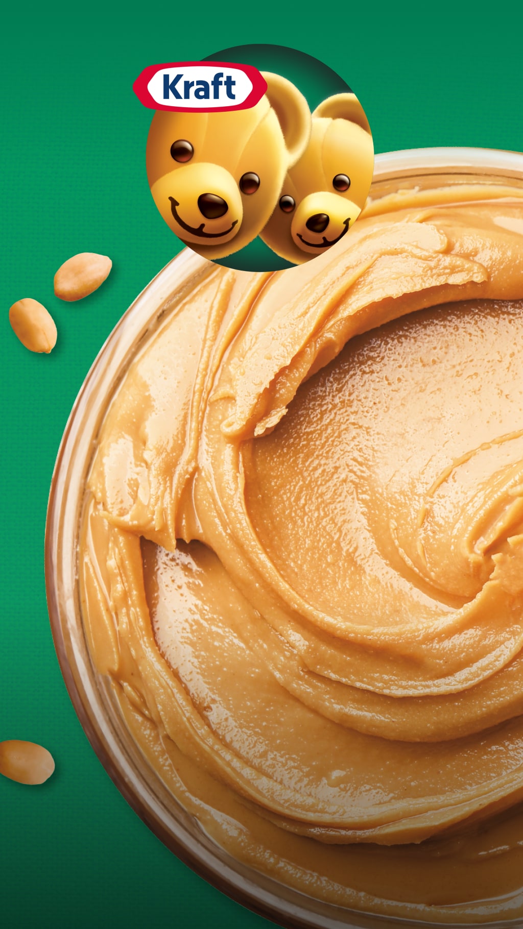 Jar of Kraft peanut butter with peanuts and Kraft logo.